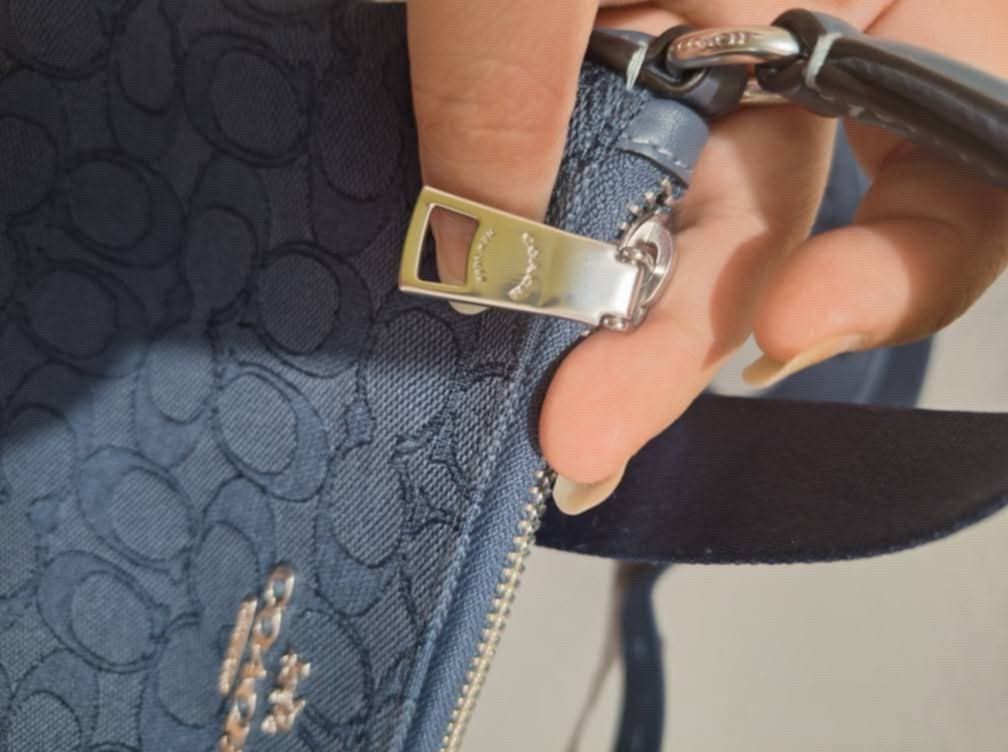 Coach Pace Slim Blue Crossbody Bag (Category: Luxury Bags & Wallets) located in Quezon City. Submitted by tata_yeontan (Listing ID 1349563176, Image 3). Description: Coach Blue Sling Bag Brand New & Guaranteed Authentic Limited color and wide straps Bought from Coach Boutique in Japan With dust bag and tags but no paper bag.
