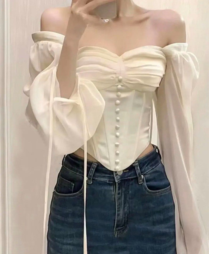 Dainty longsleeve Corset boning (Category: Others Tops) located in Manila. Submitted by BrandedCornerOutlet (Listing ID 1349643941, Image 1). Description: Size large. Actual when worn is already posted. Can worn pa offshie or as is. Bought this online for 1,500 selling it low cause the button on the middle is lost. With boning so it can define the shape of your body best fit talga to for large frame☺️ rfs: too large on me Ps. color may slightly v