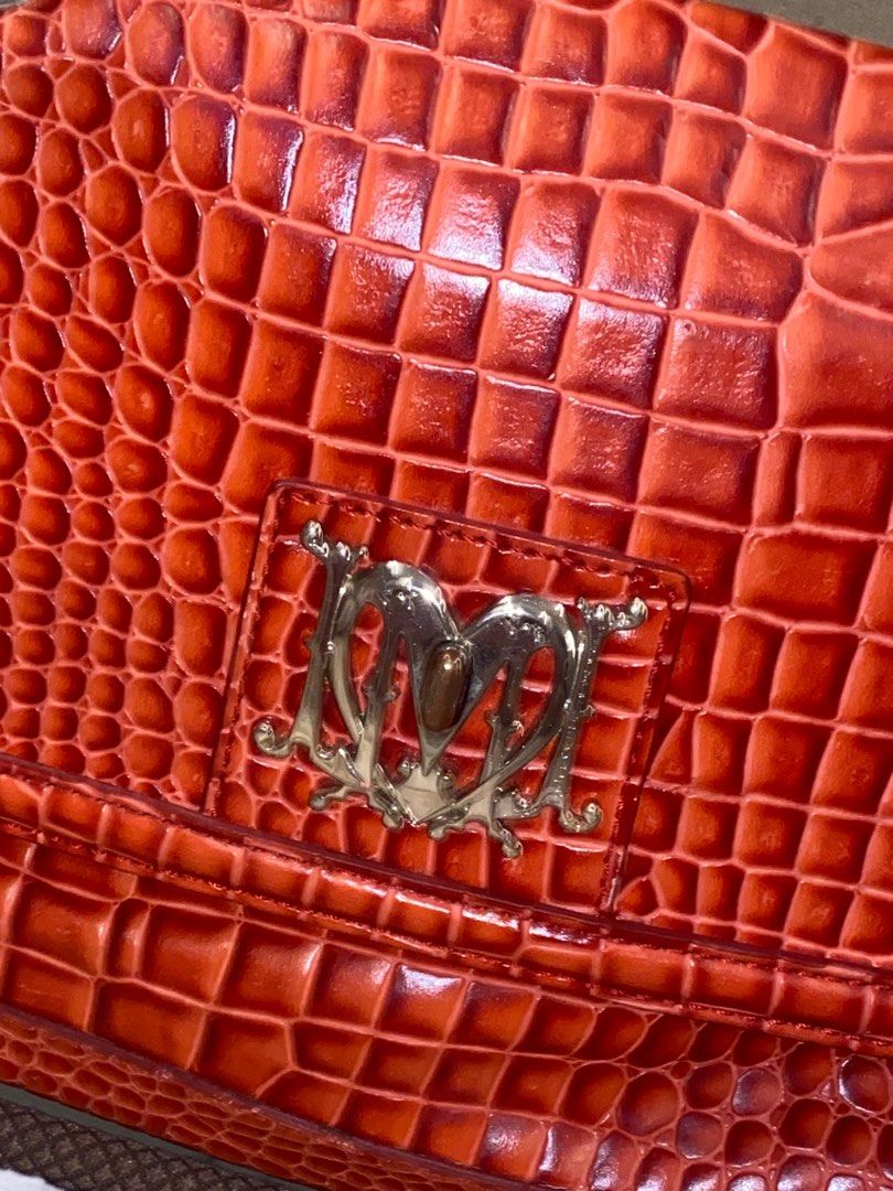 Love Moschino Red Purse (Category: Luxury Bags & Wallets) located in Muntinlupa City. Submitted by indigopuma1 (Listing ID 1349696638, Image 2). Description: - 100% authentic - see pics for flaws .