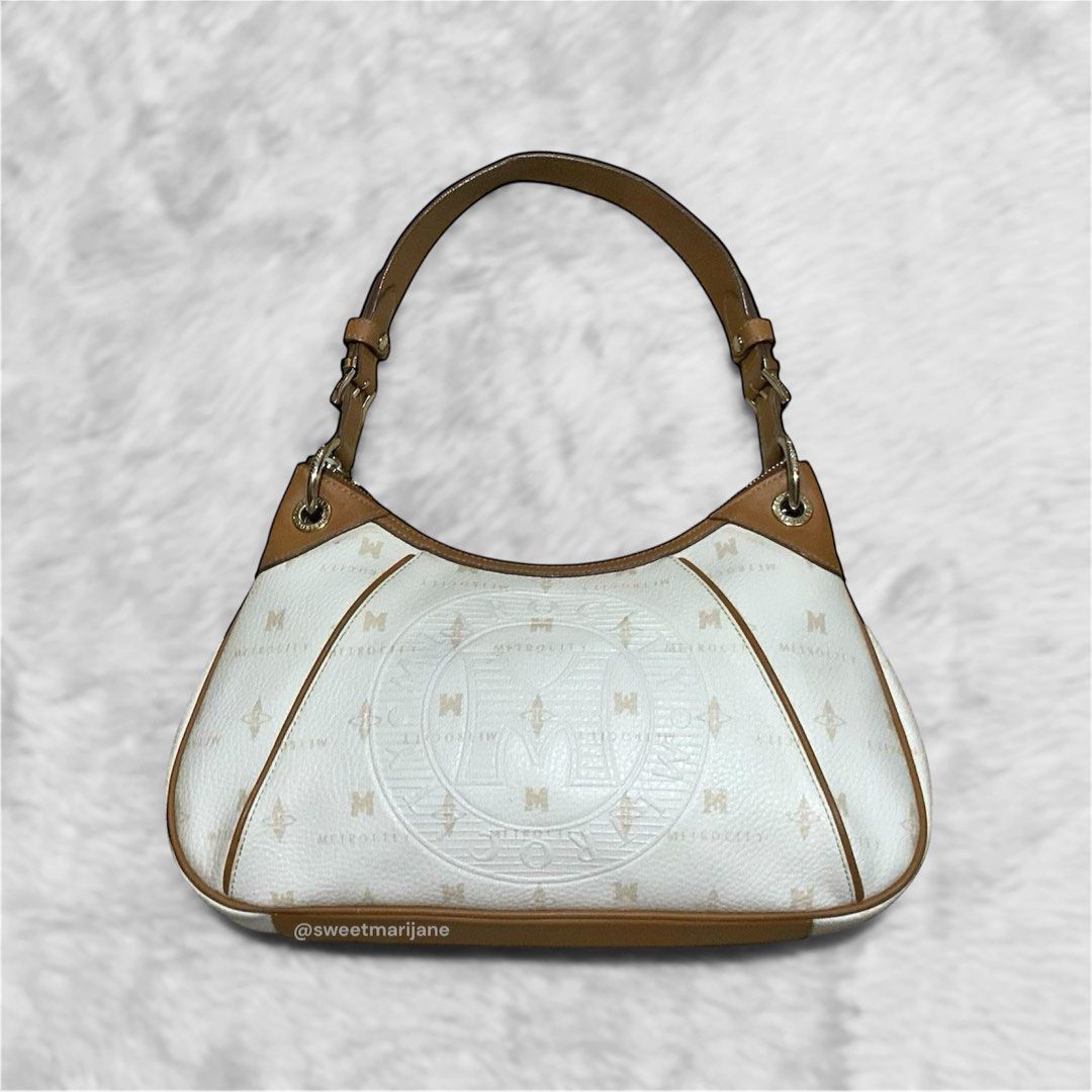 Metro City Genuine Leather Medium Shoulder Bag (Category: Luxury Bags & Wallets) located in Bulacan. Submitted by sweetmarijane (Listing ID 1348614123, Image 1). Description: Metro City Genuine Leather Medium Baguette Bag ~ Personal Collection ~ Excellent condi ~ No flaws only minimal press mark on the handle 💛Guaranteed Authentic 🧡Please no lowballing! 🤎All the details are in the photos 🤎This is not a brand new product, manage your expectati