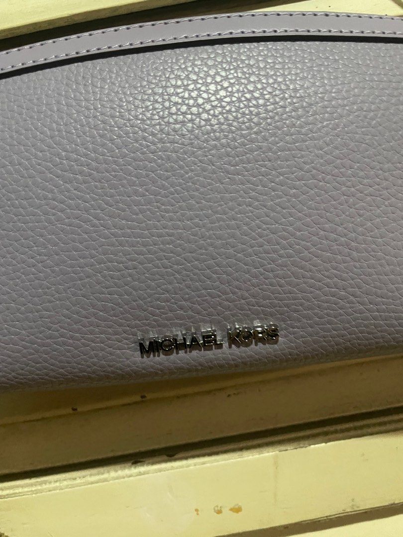 Michael Cors Cross Body Bag (Category: Purses & Pouches) located in Taguig. Submitted by secondclosetph (Listing ID 1349634352, Image 2). Description: Good condition Authentic Gifted RSF: Not my style.