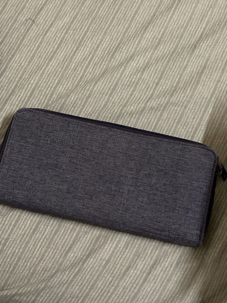 Muji Travel Wallet (Category: Wallets & Card holders) located in Manila. Submitted by meg1220 (Listing ID 1349553255, Image 1). Description: Perfect for travelling and putting different currencies. .