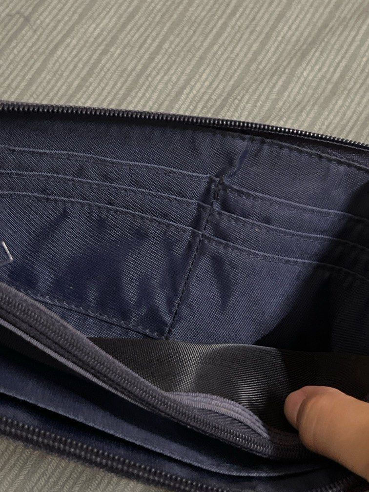 Muji Travel Wallet (Category: Wallets & Card holders) located in Manila. Submitted by meg1220 (Listing ID 1349553255, Image 3). Description: Perfect for travelling and putting different currencies. .