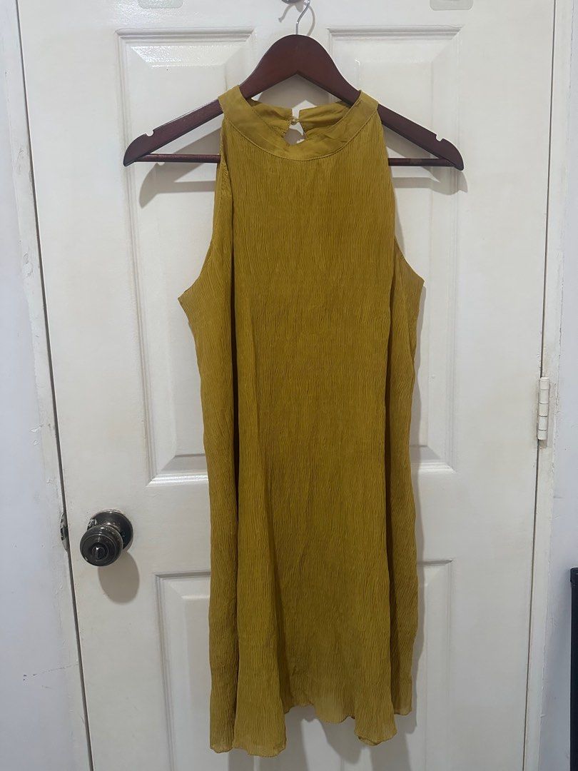 ZARA inspired mustard yellow haltered dress (Category: Dresses) located in Quezon City. Submitted by cnccollections (Listing ID 1349629110, Image 3). Description: ZARA inspired dress (1st photo for reference only) Flowy yellow mustard dress Double layer Fits XS-M frame.