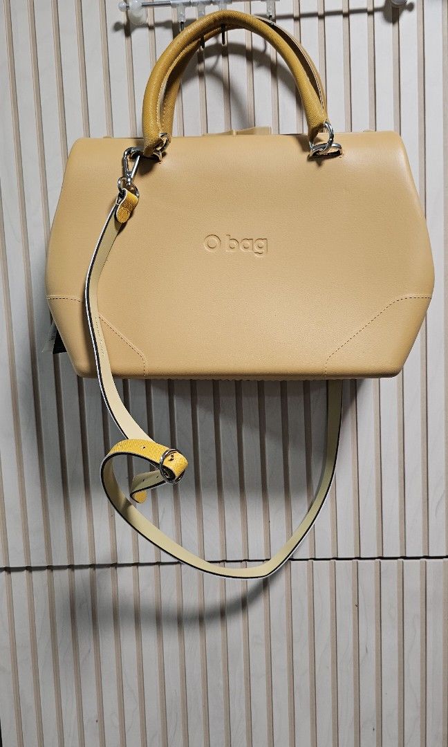 OBag Biscuit (Category: Cross-body Bags) located in Singapore. Submitted by aquazest (Listing ID 1349681798, Image 2). Description: Brand new in packaging with tag. Waterproof and environmental friendly. 33,5cm length, 36,5cm height, 12cm depth. Body: Thermoplastic compound. Handle: 76% cotton 24% polyester Shoulder strap: 10% cotton 50% polyurethane 40% polyester.