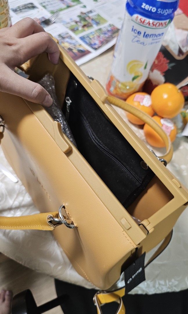 OBag Biscuit (Category: Cross-body Bags) located in Singapore. Submitted by aquazest (Listing ID 1349681798, Image 3). Description: Brand new in packaging with tag. Waterproof and environmental friendly. 33,5cm length, 36,5cm height, 12cm depth. Body: Thermoplastic compound. Handle: 76% cotton 24% polyester Shoulder strap: 10% cotton 50% polyurethane 40% polyester.
