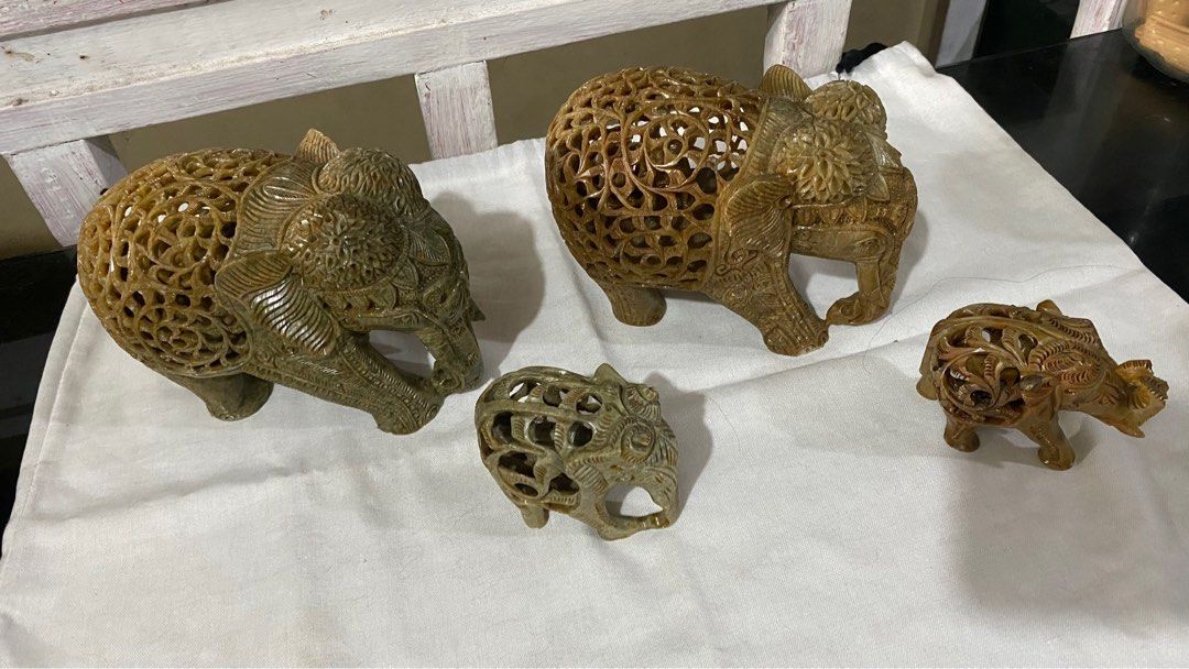 Soapstone Carved Elephant Figurine (Category: Vintage Collectibles) located in Manila. Submitted by eyarti (Listing ID 1349666719, Image 2). Description: Selling this vintage collection babies as set 😍 Price negotiable, message me for offers 😉 🐘 Carved in dainty jali, for open work, the mother elephants tummy reveals a baby elephant inside. Crafted by traditional artisans from the city of the symbol of eternal love, the Taj Mahal 🐘 An intrica