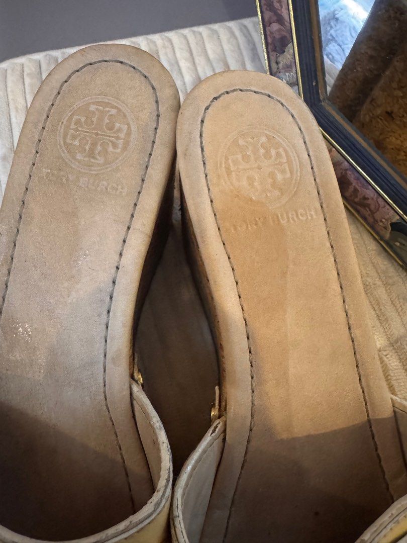 Tory Burch Pamela Tan gold wedge platform (Category: Wedges) located in Santa Maria. Submitted by tropique (Listing ID 1349585637, Image 3). Description: Signs of usage as seen in pics. But still in good condition. Well loved Size7 Have some flaws as seen in pics .