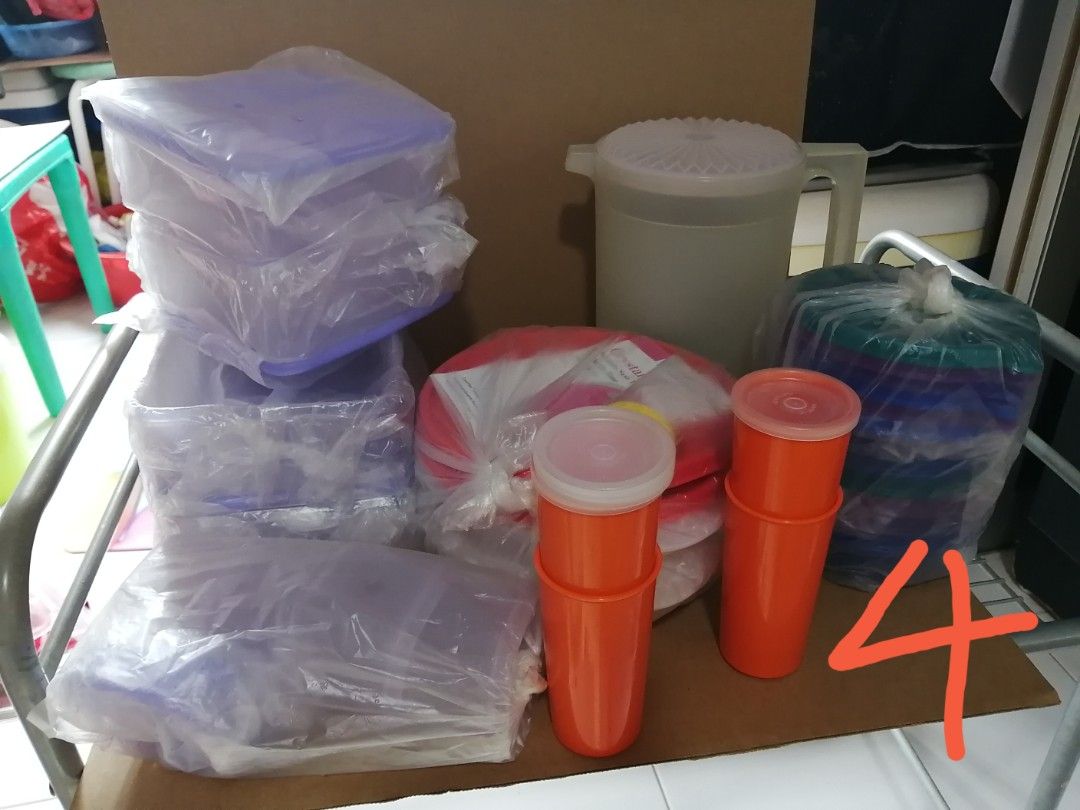 Tupperware Bundle 4 (Category: Food Organisation & Storage) located in Singapore. Submitted by doboey (Listing ID 1349632002, Image 1). Description: Assorted Tupperwares (big n small, worth more than $50/-). Self-collect from S-680420.