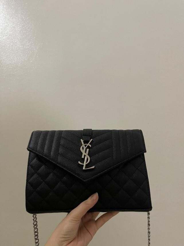 YSL Woc in Silver Hardware (Category: Luxury Bags & Wallets) located in Mandaluyong City. Submitted by jara68494 (Listing ID 1349597015, Image 1). Description: YSL WOC Silver Hardware Okay to keep if no one buys it😊 Used mostly on travels No paperbag, dustbag and receipt Can do meetups for checking Open for nego.