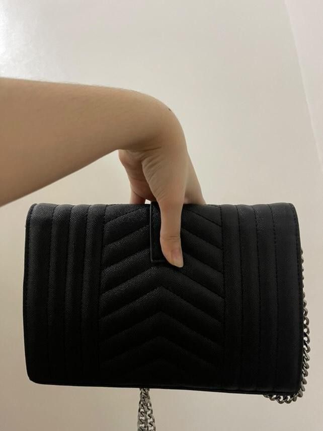 YSL Woc in Silver Hardware (Category: Luxury Bags & Wallets) located in Mandaluyong City. Submitted by jara68494 (Listing ID 1349597015, Image 3). Description: YSL WOC Silver Hardware Okay to keep if no one buys it😊 Used mostly on travels No paperbag, dustbag and receipt Can do meetups for checking Open for nego.