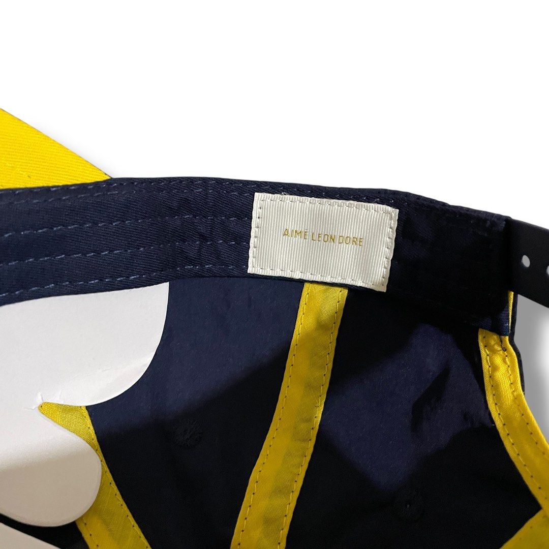 Aime Leon Dore Collegiate Nylon Cap (Category: Caps & Hats) located in Marikina City. Submitted by 1800shelves (Listing ID 1349868674, Image 3). Description: Aime Leon Dore Collegiate Nylon Dadhat (navy blue) Brand new condition One size fits all, adjustable strap Price: 🏷️ ₱ 2,200 PM for more details. Tags: ALD, Aime, Aime Leon Dore, aime leon dore cap, dadhat.