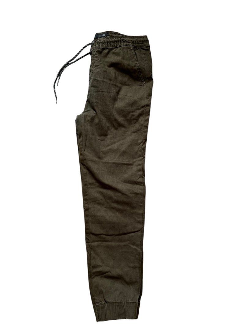 Army green jogger - Pull and bear (Category: Joggers) located in Quezon City. Submitted by vans_online_store (Listing ID 1349856507, Image 2). Description: Brand: Pull and bear Rfs: Declutter Size: Large Fabric: Cotton like, makapal Dimensions in Inches: Width: 32 Length: 37 Semi stretch No issues Preloved clothes Used only twice Can do meet ups around MRT shaw Shipping fee shouldered by the buyer.
