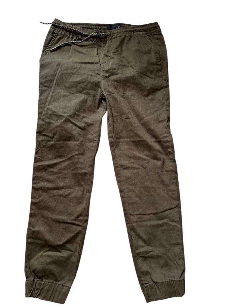 Army green jogger - Pull and bear (Category: Joggers) located in Quezon City. Submitted by vans_online_store (Listing ID 1349856507, Image 1). Description: Brand: Pull and bear Rfs: Declutter Size: Large Fabric: Cotton like, makapal Dimensions in Inches: Width: 32 Length: 37 Semi stretch No issues Preloved clothes Used only twice Can do meet ups around MRT shaw Shipping fee shouldered by the buyer.