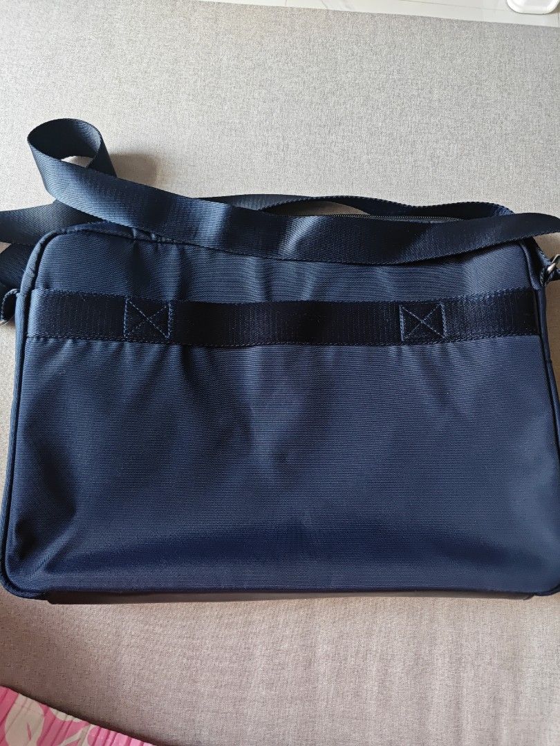 Authentic Tommy Hilfiger Laptop Messenger Bag (Category: Laptop Bags & Sleeves) located in Quezon City. Submitted by ohitsyel (Listing ID 1349765756, Image 3). Description: Authentic Tommy Hilfiger Laptop Messenger Bag fits 15" laptop lots of compartment inside selling for 1500 only ‼️‼️ reduced to 1.1k ‼️‼️ lightly used, but selling low because of the removed Y on front, E almost removed, and a small issue on top aside from that, no issues (see 