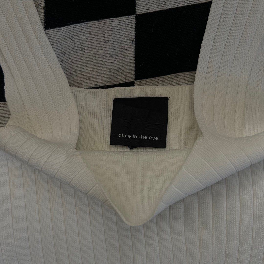 Basic knotted white cropped top (Category: Sleeveless) located in Paranaque City. Submitted by pattypops (Listing ID 1349813791, Image 2). Description: Basic white ALICE IN THE EVE top | M on tag, comfy on S.