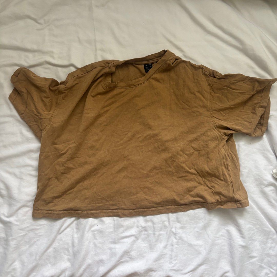 Brown Crop Top (Category: Shirts) located in Quezon City. Submitted by goodstuffph (Listing ID 1349783195, Image 1). Description: • good condition • 100% cotton • ₱248 original price in Shein.