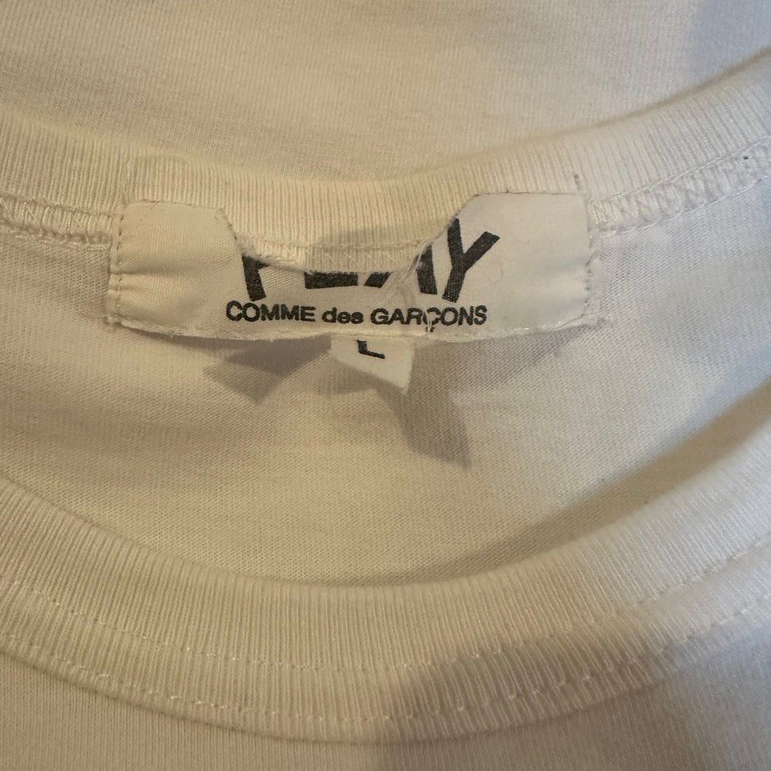 Cdg play heart tee (Category: Tshirts & Polo Shirts ) located in Quezon City. Submitted by hetchup (Listing ID 1349846906, Image 3). Description: Pit to pit- 20 Length- 26 Issue/s: As shown T-Shirt in used condition. Please don’t expect that the item is 100% perfect. Tags: Comme des garcons .