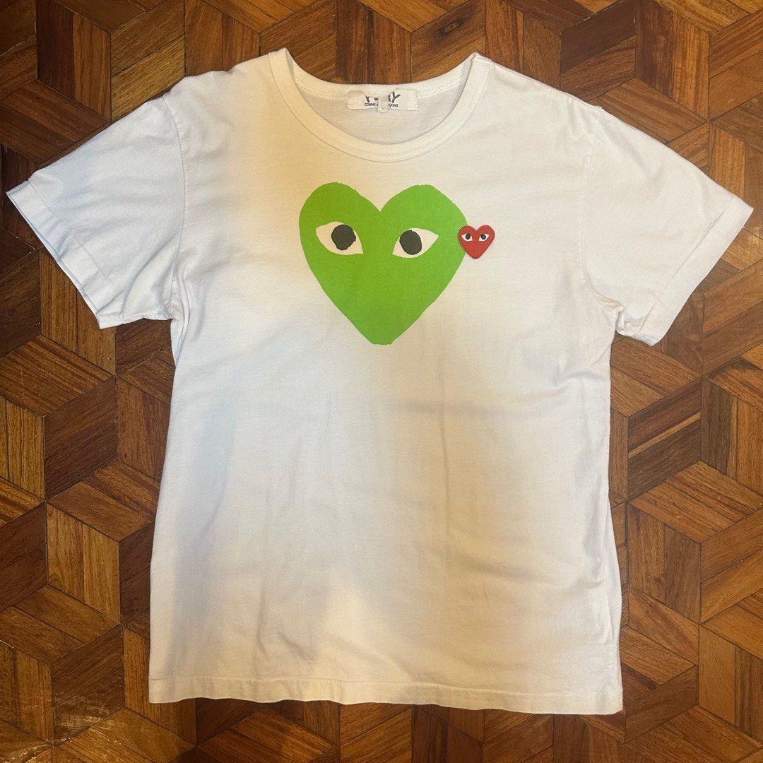 Cdg play heart tee (Category: Tshirts & Polo Shirts ) located in Quezon City. Submitted by hetchup (Listing ID 1349846906, Image 1). Description: Pit to pit- 20 Length- 26 Issue/s: As shown T-Shirt in used condition. Please don’t expect that the item is 100% perfect. Tags: Comme des garcons .