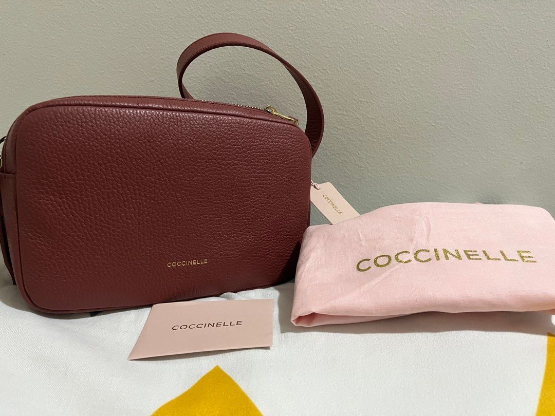 SELLING LOW: COCCINELLE MALORY SLING (Category: Luxury Bags & Wallets) located in Quezon City. Submitted by dropshopselections (Listing ID 1349913862, Image 1). Description: original with tag, ccard, dbag 22 x 14 x 9cm double zip cam bag valued at 17.9k+.