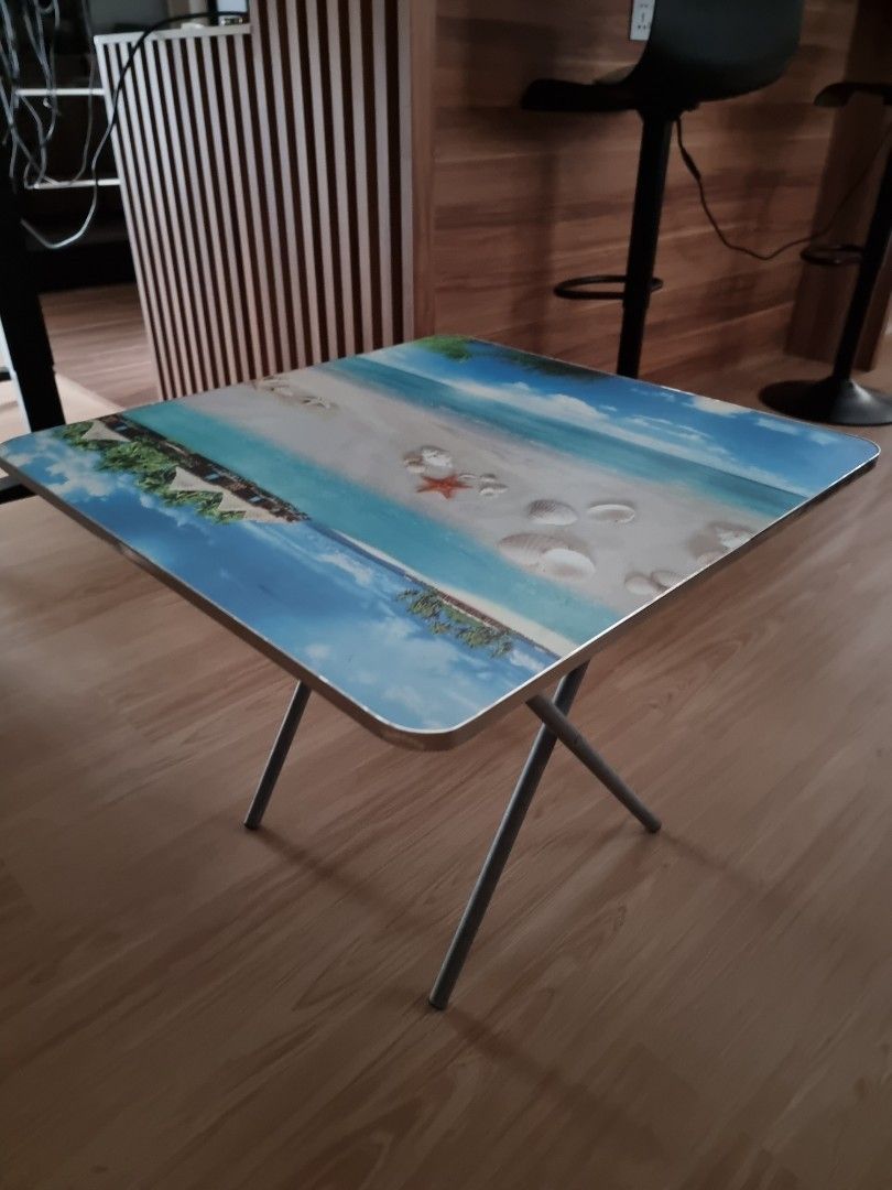Foldable Small table (Category: Tables & Sets) located in Singapore. Submitted by extremejoy (Listing ID 1268173367, Image 1). Description: approx 60cm L x 60cmW x 60cm H.