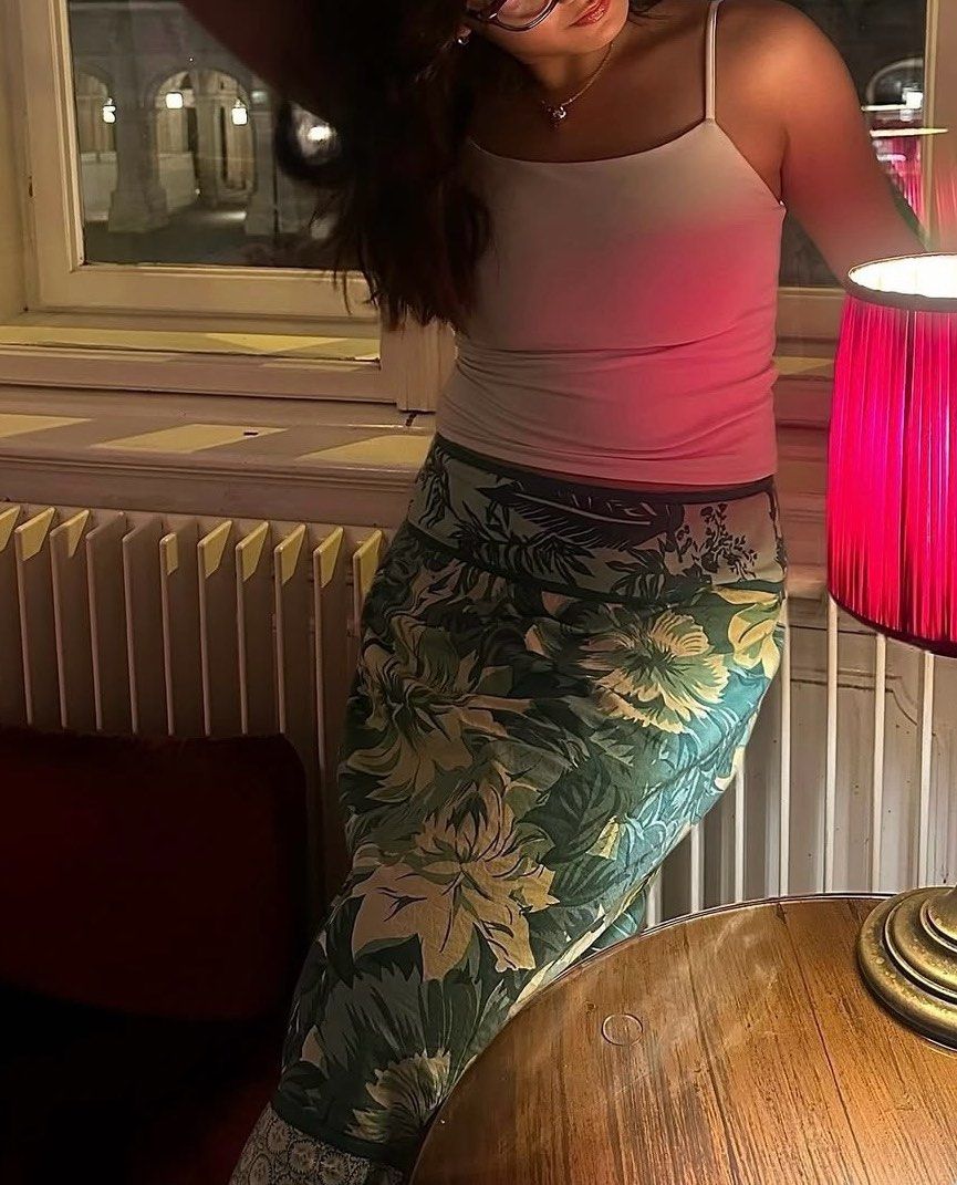 green floral midi skirt (Category: Skirts) located in Manila. Submitted by closetcleanupbyces (Listing ID 1349791178, Image 2). Description: wore this once only on a trip! 🌱 - bought from an ig shop - def one of my faves! the beads and detailings are so pretty - can fit 26-30 waist!.