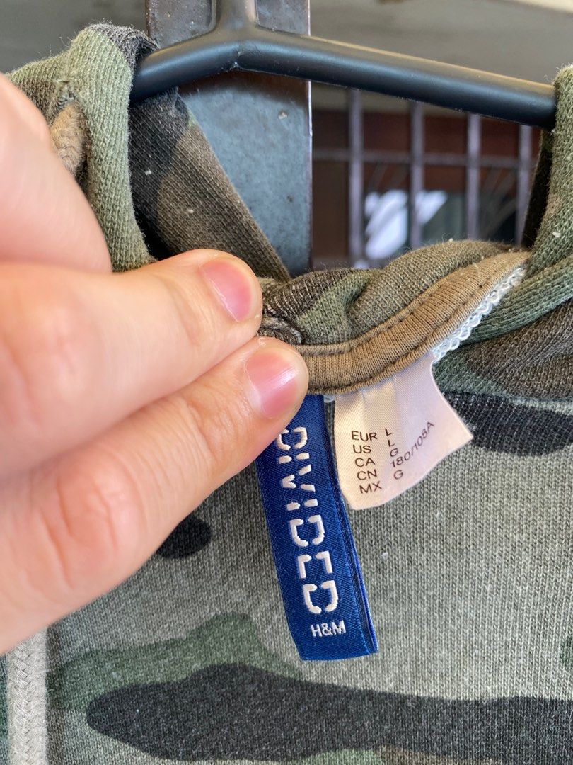 H&M Camo Jacket (Category: Coats, Jackets and Outerwear) located in Quezon City. Submitted by runitup (Listing ID 1349799320, Image 3). Description: H&M Camo Jacket L on tag (23.5x31) Loose fit See issue on last pics.