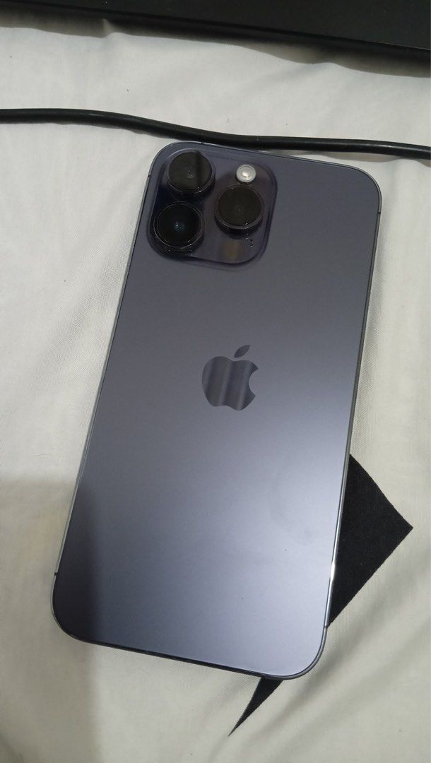Iphone 14 Pro max 1 TB (Category: iPhone 14 Series) located in Bulacan. Submitted by Sunwoo (Listing ID 1349749319, Image 3). Description: Iphone 14 Pro Max Factory unlocked 1 terabyte 76% battery health Deep purple no box with cases no issues rfs: upgrade.