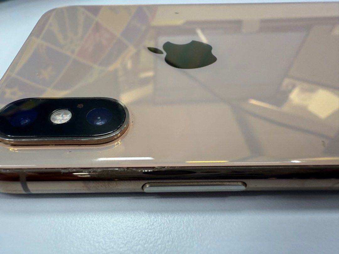 IPhone XS (Category: iPhone X Series) located in General Trias. Submitted by llayneaquino (Listing ID 1349795050, Image 2). Description: Iphone XS Gold 64Gb No Sim Restriction Working Face ID Working True Tone No camera issues 73 Battery Health Issues: No screen protector Replaced Backglass Scratches on side Ringer flip not working - can be turned on/off thru Assistive Touch Inclusions: Unit, case and box only Charger and earpods not included Sel