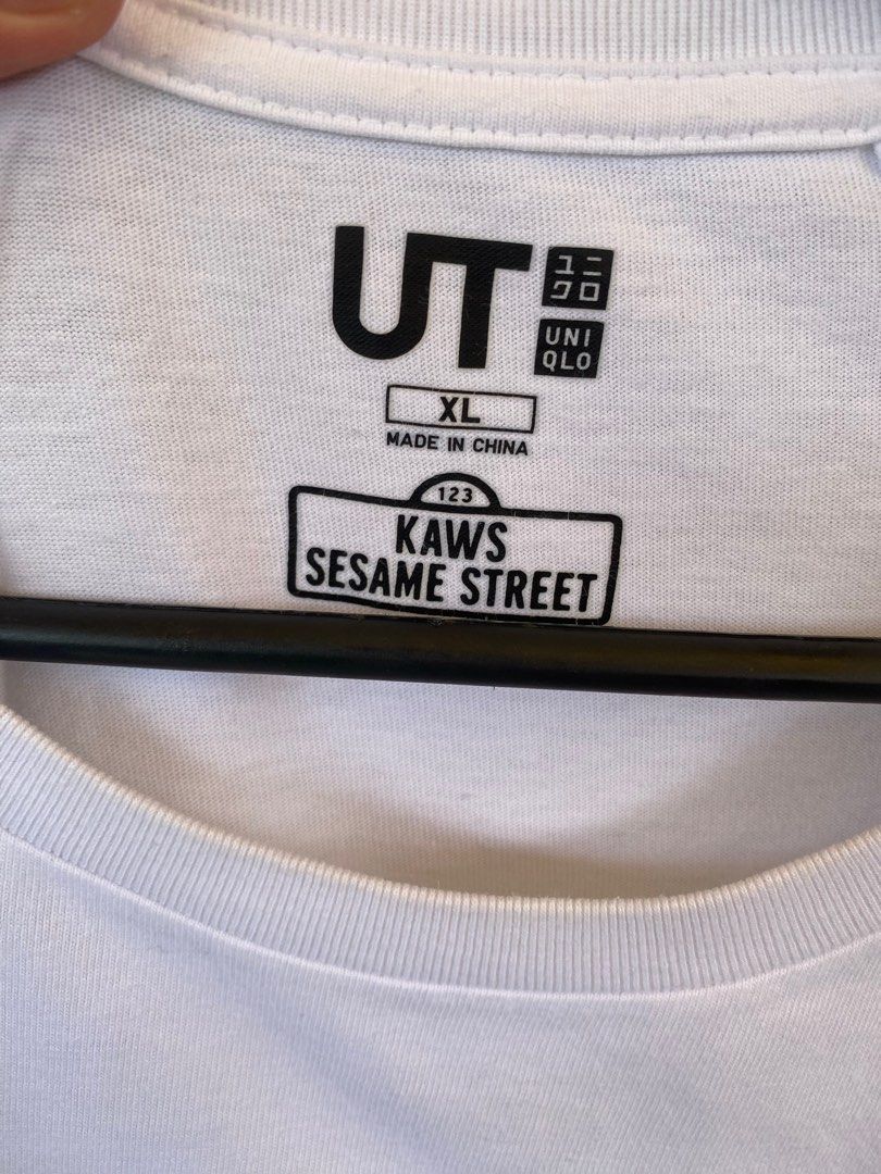 Kaws x Uniqlo Pocket Tee (Category: Tshirts & Polo Shirts ) located in Quezon City. Submitted by runitup (Listing ID 1349801574, Image 3). Description: Kaws X Uniqlo Sesame Street Cookie Monster Pocket Tee XL on tag (23x28) No issues.
