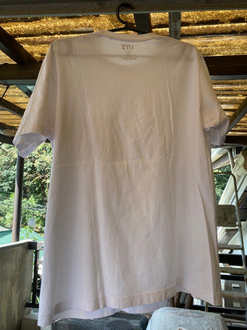 Kaws x Uniqlo Pocket Tee (Category: Tshirts & Polo Shirts ) located in Quezon City. Submitted by runitup (Listing ID 1349801574, Image 2). Description: Kaws X Uniqlo Sesame Street Cookie Monster Pocket Tee XL on tag (23x28) No issues.