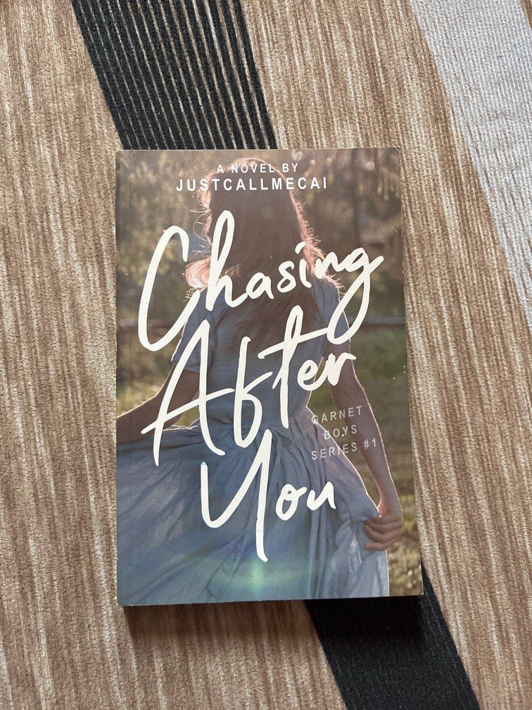 PISCOM Chasing After You by Justcallmecai (Category: Storybooks) located in Paranaque City. Submitted by rieclutter (Listing ID 1349799702, Image 1). Description: -WATTPAD BOOK -light yellow mark on edges but none inside.