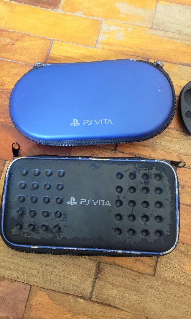 PsVita Pouch and Silicone Case Set (Category: Cases & Covers) located in Pasig City. Submitted by retvsl (Listing ID 1349771788, Image 2). Description: Decluttering my Ps Vita Slim Accessories: *2 Vita Pouch Cases (blue and black) *2 PsVita silicone cases (black and white) Take all for only P350 (fixed) Note: with signs of usage but all still good. Pls see photos for reference Location: Manggahan, Pasig SF shouldered by the buyer.