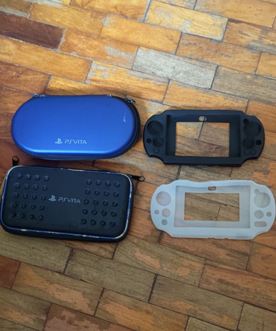 PsVita Pouch and Silicone Case Set (Category: Cases & Covers) located in Pasig City. Submitted by retvsl (Listing ID 1349771788, Image 1). Description: Decluttering my Ps Vita Slim Accessories: *2 Vita Pouch Cases (blue and black) *2 PsVita silicone cases (black and white) Take all for only P350 (fixed) Note: with signs of usage but all still good. Pls see photos for reference Location: Manggahan, Pasig SF shouldered by the buyer.