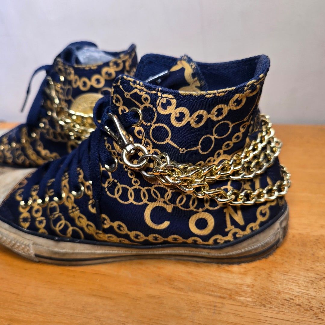 RARE Converse All Star Navy Blue with Gold Chains (Category: Casual Shoes) located in Makati City. Submitted by HappyDeclutterer (Listing ID 1349824832, Image 3). Description: Add some OOMPH to your outfit with this Rare Converse All Star High Top style sneakers with Gold Chains design attached to the shoes. Bought this pair in Bangkok over 10 years ago. Used a few times and stored. Gold Chains are in good condition, with no rust or discoloration