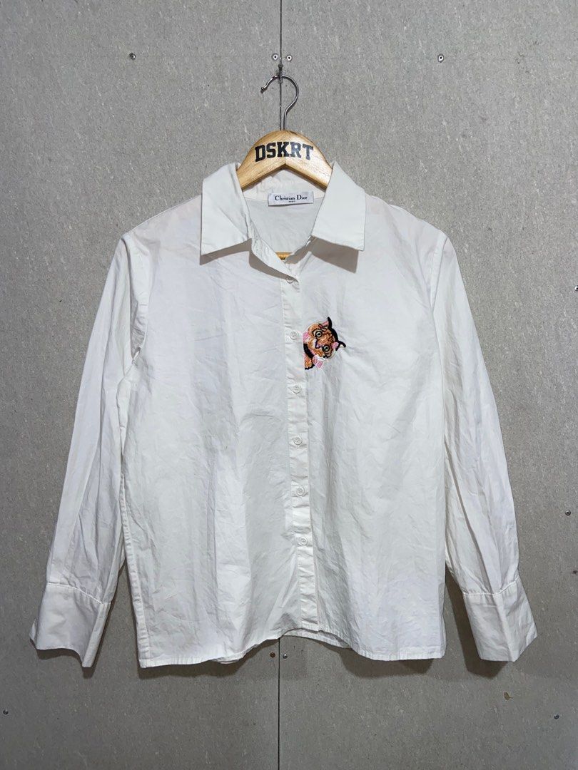 Vintage Christian Dior (Category: Luxury Apparel) located in Lucena. Submitted by pureg0od (Listing ID 1349836922, Image 1). Description: Vintage Christian dior polo slongsleev white (Authentic) Medium 21Width 25Length Excellent condition .