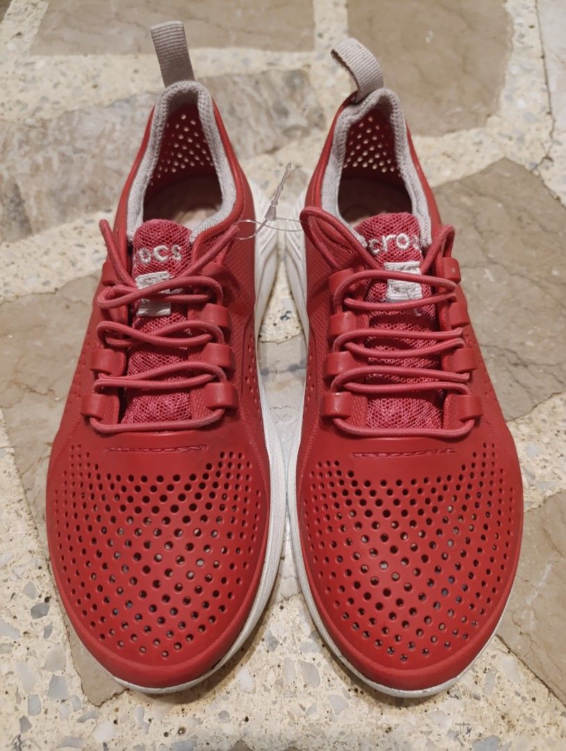 Authentic Crocs. Size 23cm (Category: Sneakers) located in Manila. Submitted by yunicool (Listing ID 1349933488, Image 1). Description: slightly used red Crocs sneakers, size 23cm, lightweight, breathable, and stylish. Perfect for everyday wear!.
