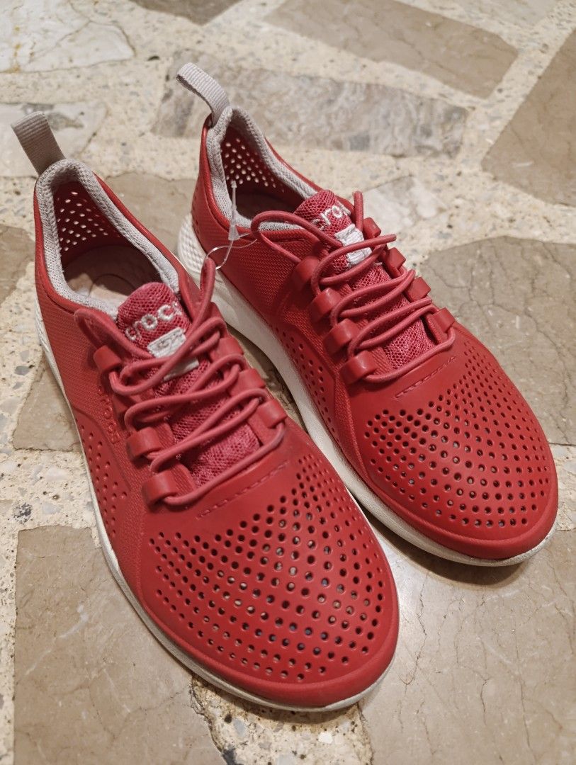 Authentic Crocs. Size 23cm (Category: Sneakers) located in Manila. Submitted by yunicool (Listing ID 1349933488, Image 2). Description: slightly used red Crocs sneakers, size 23cm, lightweight, breathable, and stylish. Perfect for everyday wear!.