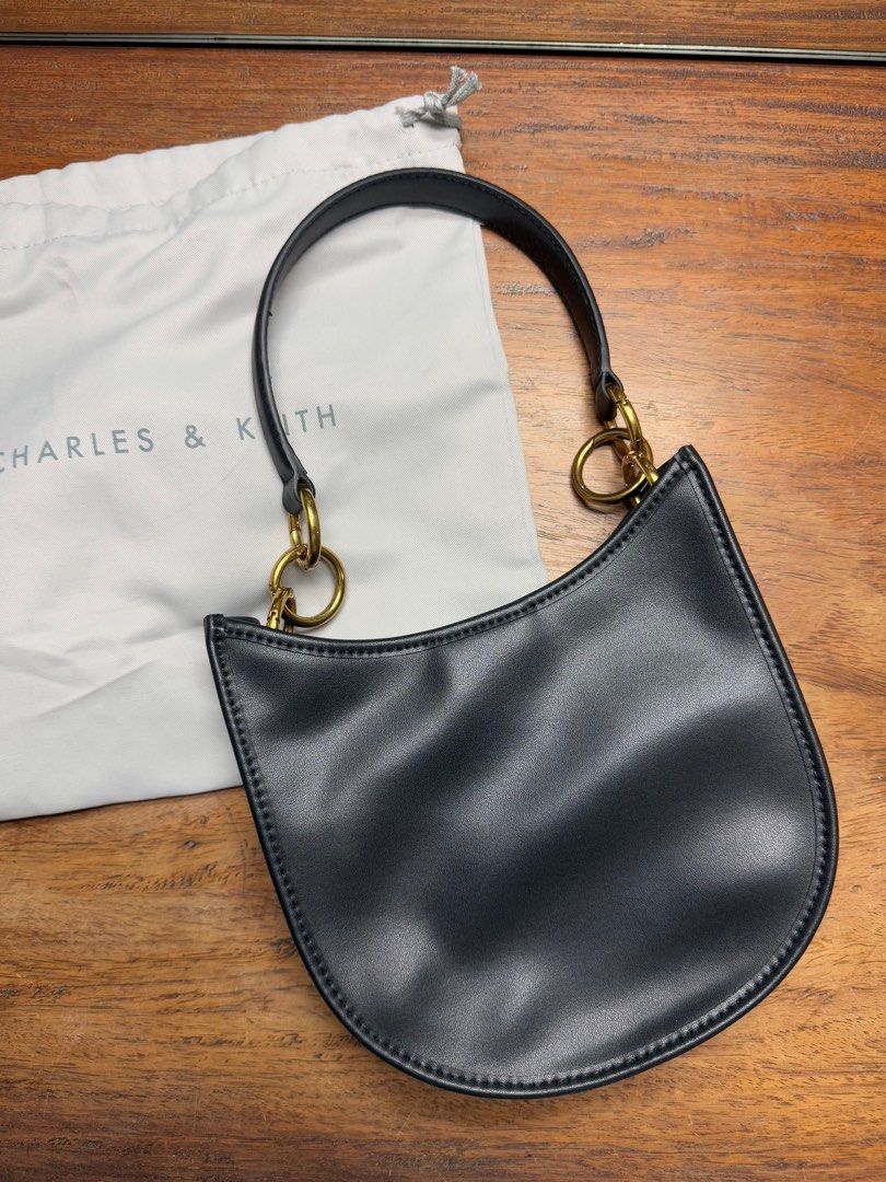 Charles and Keith Bag (Category: Shoulder Bags) located in Quezon City. Submitted by monsdeclutter (Listing ID 1349967477, Image 2). Description: Authentic, bought in store Comes with long strap (never been used) Actual color may vary (due to lighting and camera settings) Price negotiable but no to lowballing MOP: Gcash MOD: SDD (grab/lalamove) or GGX Note: Strictly payment first before shipping SDD booked by buyer SF shouldered by buyer.