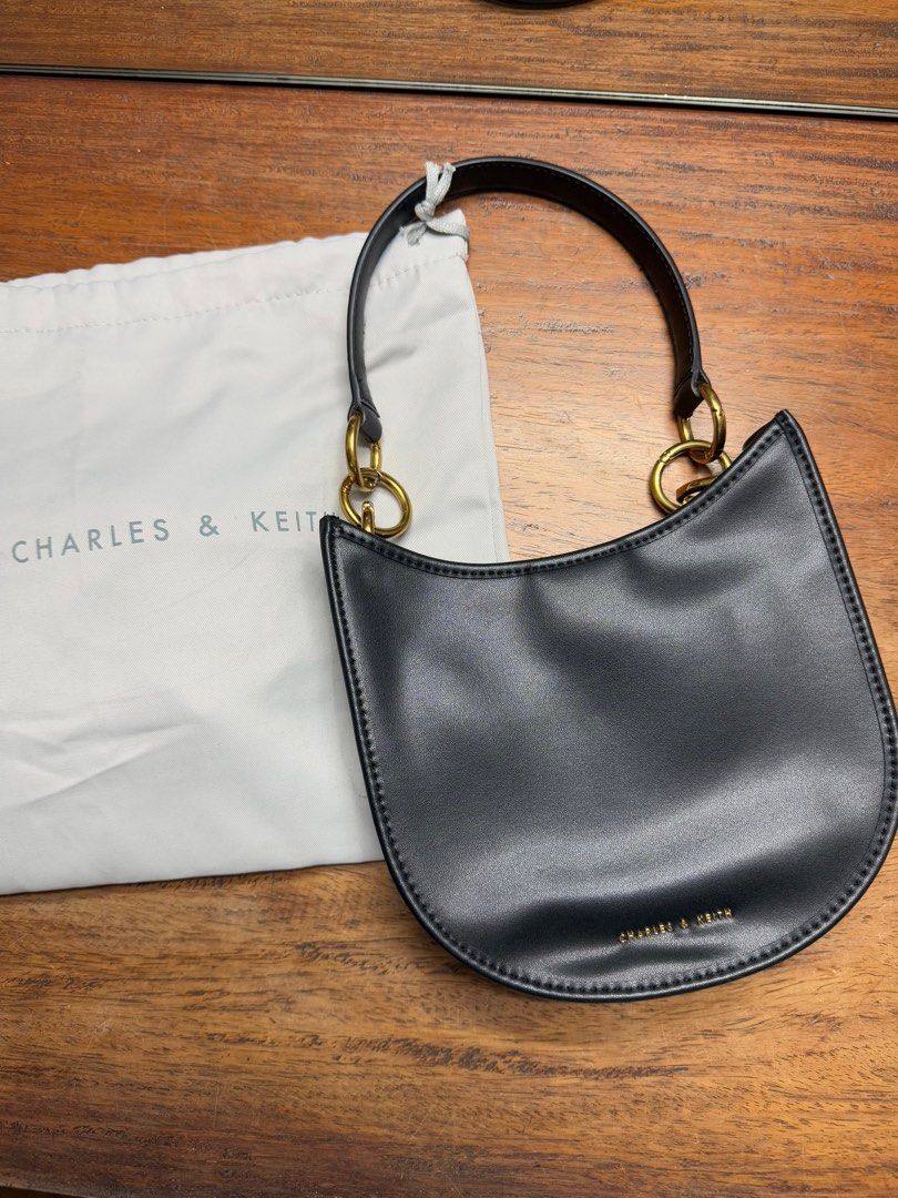 Charles and Keith Bag (Category: Shoulder Bags) located in Quezon City. Submitted by monsdeclutter (Listing ID 1349967477, Image 1). Description: Authentic, bought in store Comes with long strap (never been used) Actual color may vary (due to lighting and camera settings) Price negotiable but no to lowballing MOP: Gcash MOD: SDD (grab/lalamove) or GGX Note: Strictly payment first before shipping SDD booked by buyer SF shouldered by buyer.