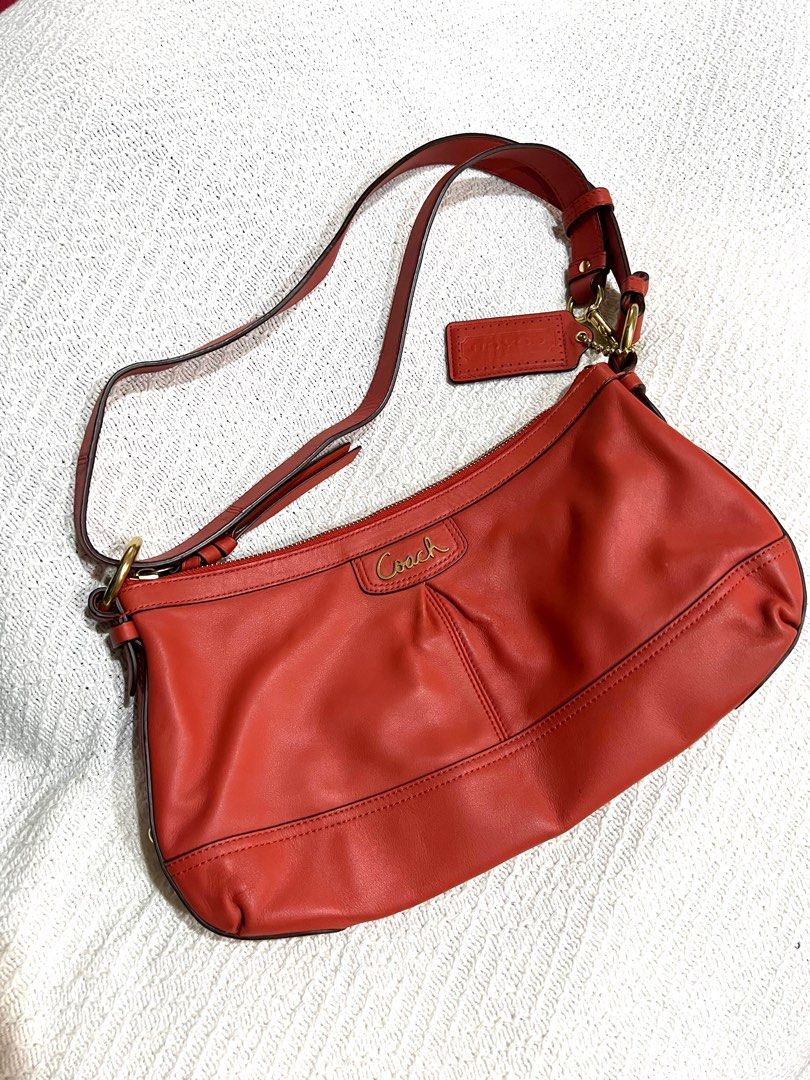 Vintage Coach Leather Bag with Adjustable Long Strap (Category: Luxury Bags & Wallets) located in Quezon City. Submitted by kuduu (Listing ID 1350026170, Image 1). Description: Beautiful red bag Clean interiors Super soft leather Clean corners, no signs of wear Only a little bit of discoloration on one of the rings from storage With care card No dustbag, but will send with proper packaging Meet up in Loyola Heights QC Delivery via lalamove, grab 