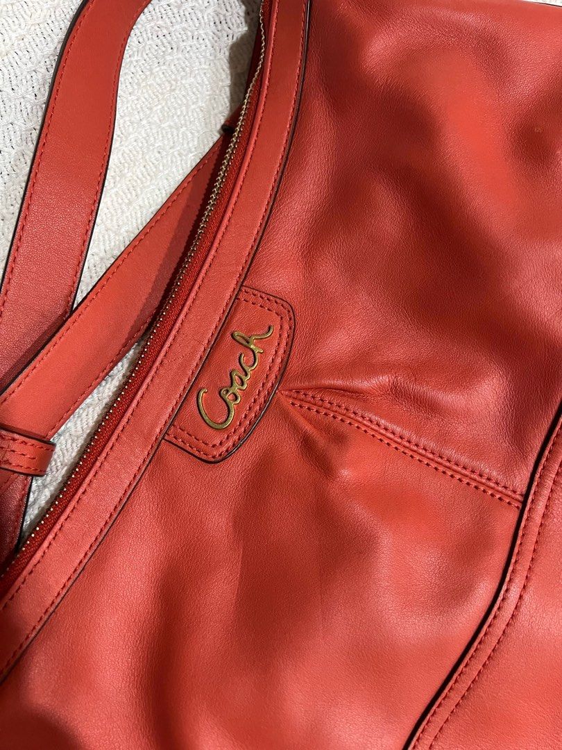 Vintage Coach Leather Bag with Adjustable Long Strap (Category: Luxury Bags & Wallets) located in Quezon City. Submitted by kuduu (Listing ID 1350026170, Image 2). Description: Beautiful red bag Clean interiors Super soft leather Clean corners, no signs of wear Only a little bit of discoloration on one of the rings from storage With care card No dustbag, but will send with proper packaging Meet up in Loyola Heights QC Delivery via lalamove, grab 