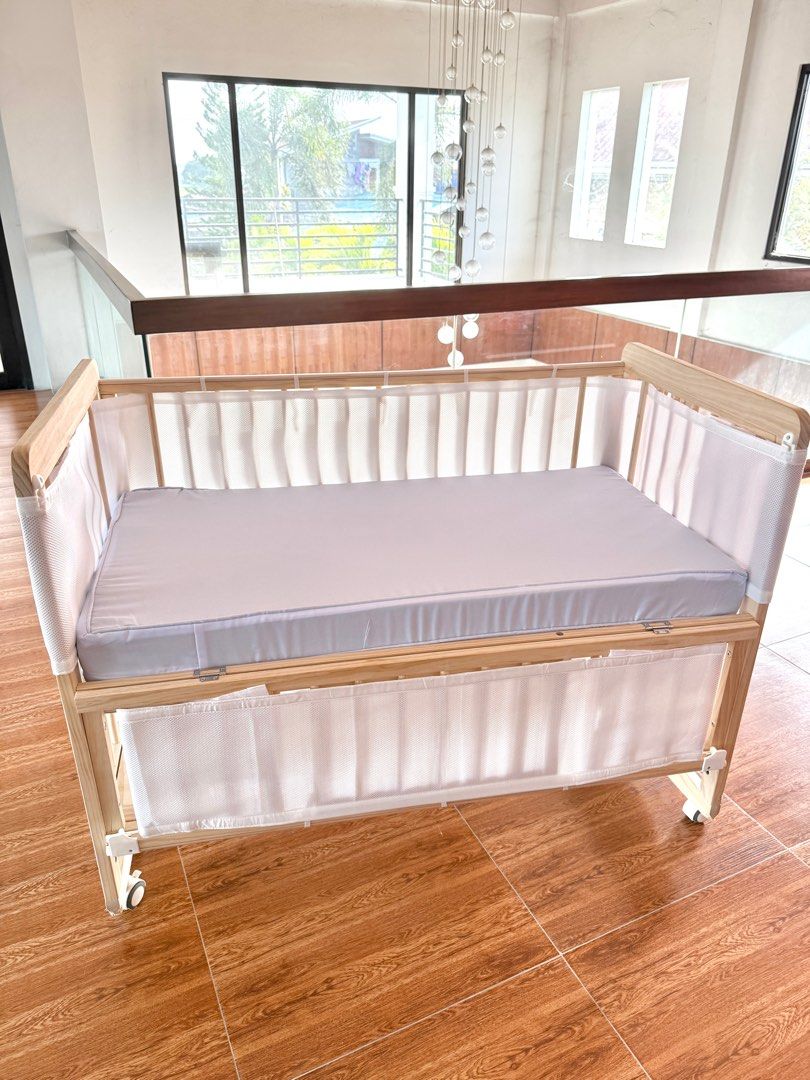Cocolala Tyler 6in1 Crib (Category: Cots & Cribs) located in Guiguinto. Submitted by jnkzpt (Listing ID 1349987456, Image 2). Description: Cocolala Tyler 6in1 Crib With Free 2pcs Crib Bedsheet and Breathable Bumper Issue: May ngatngat po ng dogs yung lower part as shown in the photos 📍Guiguinto, Bulacan.