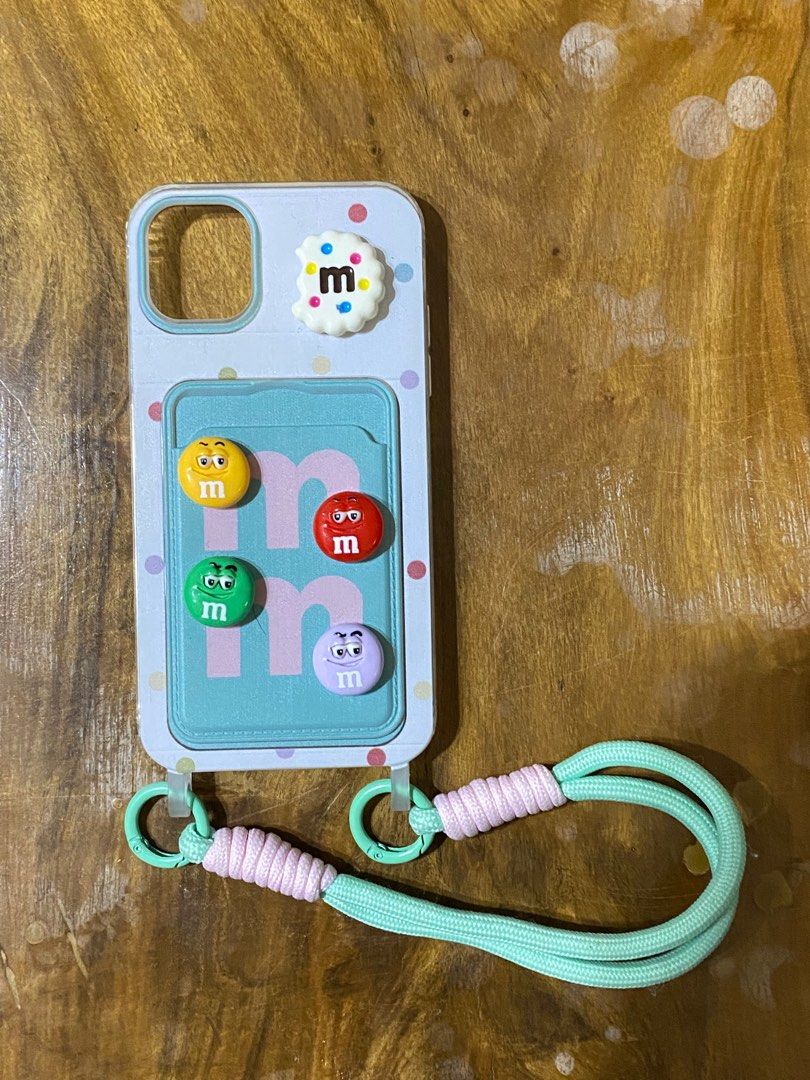 iPhone 11 M&M case (Category: Cases & Sleeves) located in Cebu City. Submitted by karent3000 (Listing ID 1349967563, Image 1). Description: + sf Bought from the orange app. Rfs not my type..