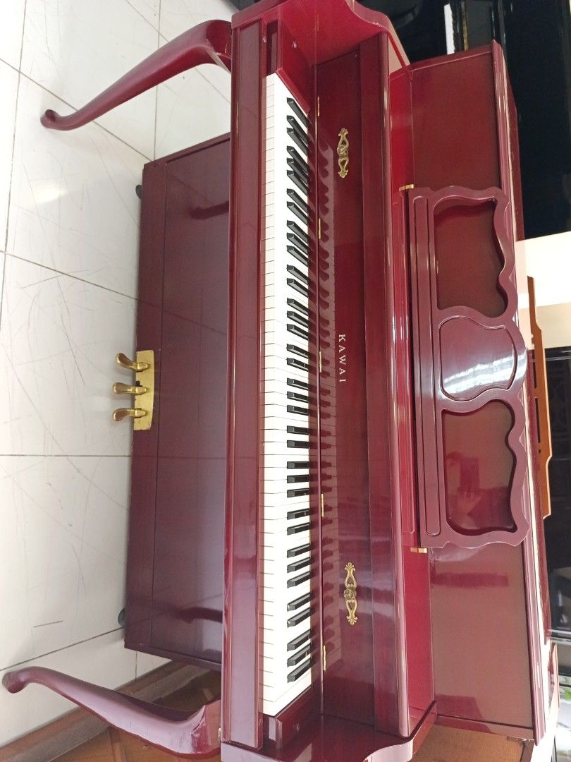 Kawai console piano (Category: Musical Instruments) located in Manila. Submitted by swiftstar.3eae19 (Listing ID 1349951229, Image 1). Description: A piano with exceptional caliber. it has a soundboard of selected solid spruce with an excellent foundation for superb tone and long term tuning stability..