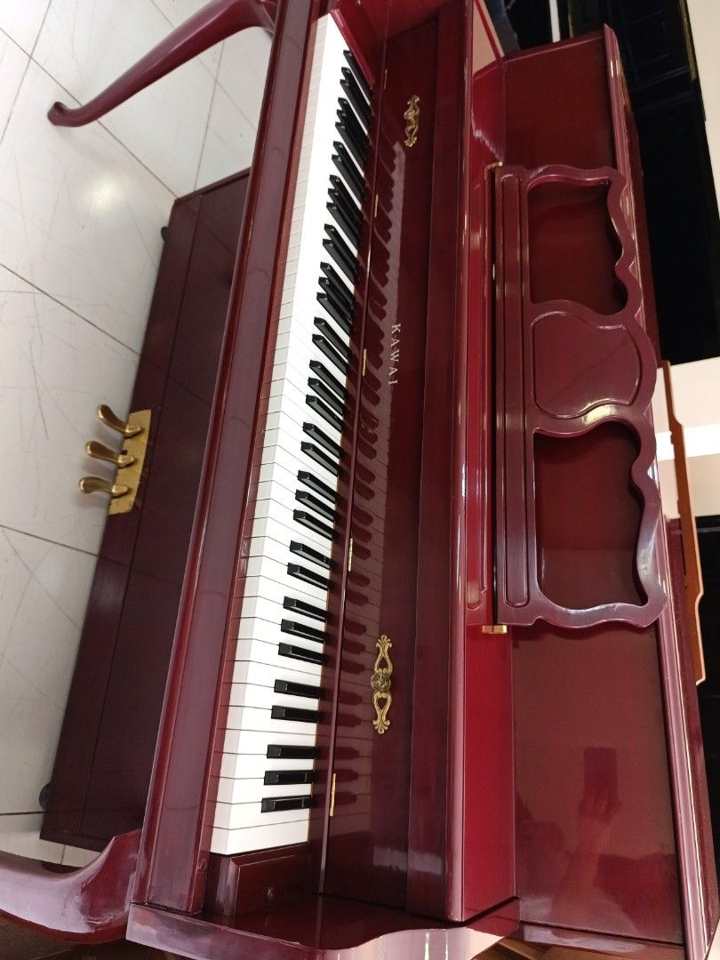 Kawai console piano (Category: Musical Instruments) located in Manila. Submitted by swiftstar.3eae19 (Listing ID 1349951229, Image 3). Description: A piano with exceptional caliber. it has a soundboard of selected solid spruce with an excellent foundation for superb tone and long term tuning stability..