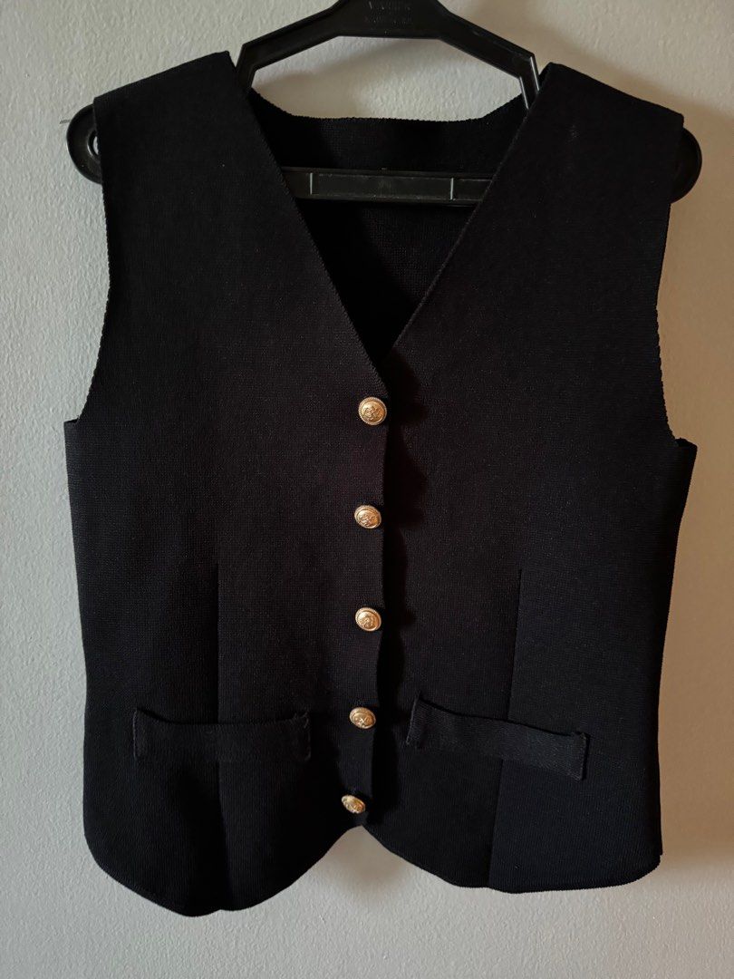 knit vest (Category: Sleeveless) located in Consolacion. Submitted by thebundlequeen (Listing ID 1349950109, Image 2). Description: - fits S-M - thick knit material - bought in tiktok shop - available also in brown (pls see listings) - Ships from Cebu..
