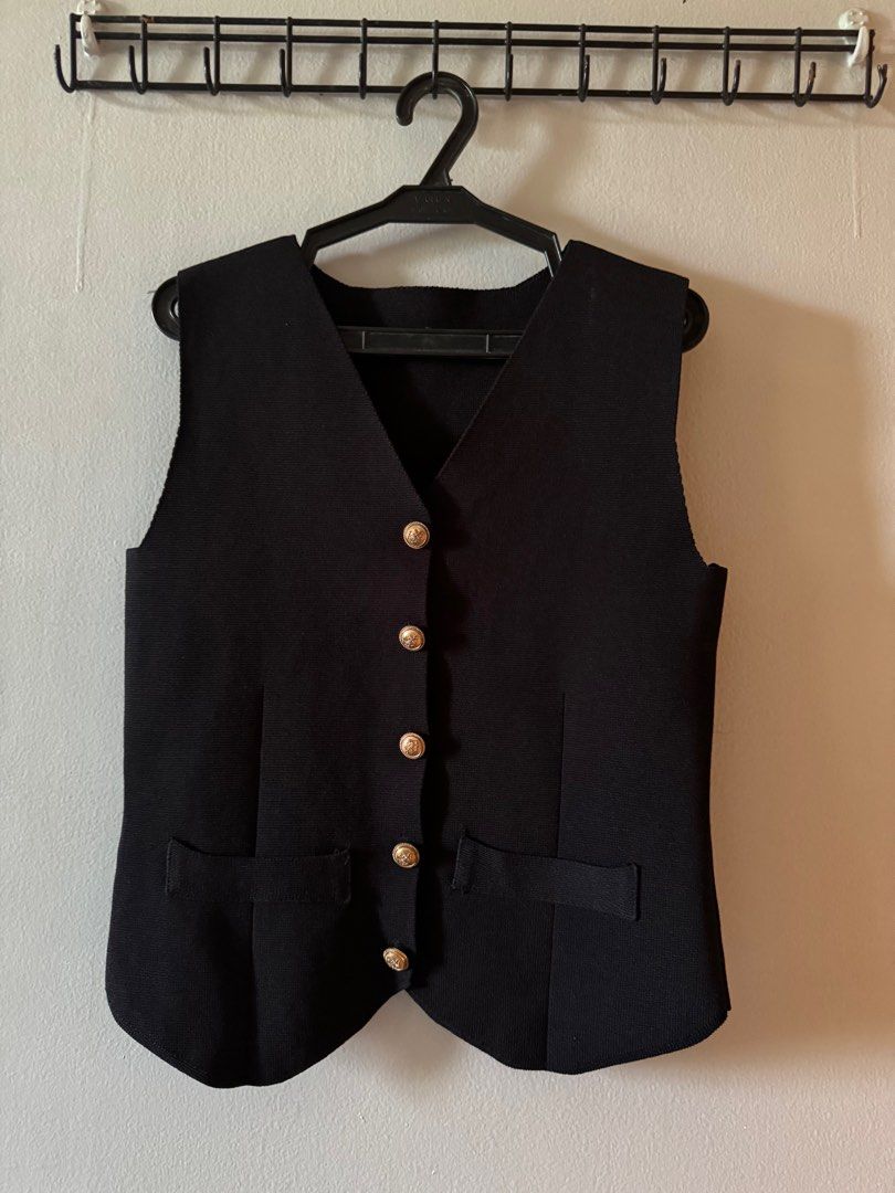 knit vest (Category: Sleeveless) located in Consolacion. Submitted by thebundlequeen (Listing ID 1349950109, Image 1). Description: - fits S-M - thick knit material - bought in tiktok shop - available also in brown (pls see listings) - Ships from Cebu..
