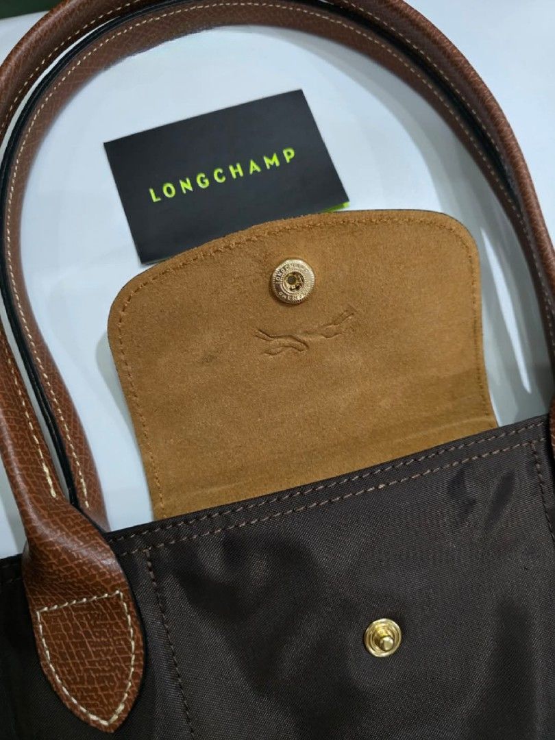 Longchamp Le Pliage Medium Long Handle - Ebony (Category: Luxury Bags & Wallets) located in Siniloan. Submitted by easyaonlinestore (Listing ID 1349950033, Image 3). Description: Longchamp Le Pliage Medium Long Handle Color: Ebony 6450.00php + SF *with carecard and paperbag 💯 Brand new 💯 Original.