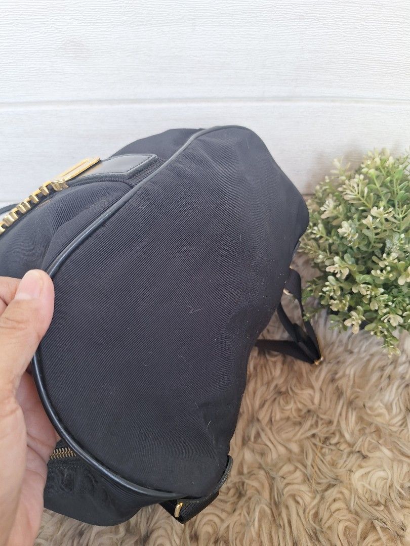 MOSHINO backpack (Category: Luxury Bags & Wallets) located in Tagum. Submitted by ynez.luxurypicksph (Listing ID 1350024754, Image 3). Description: preloved Japan medium please check photos closely for the signs of usage.